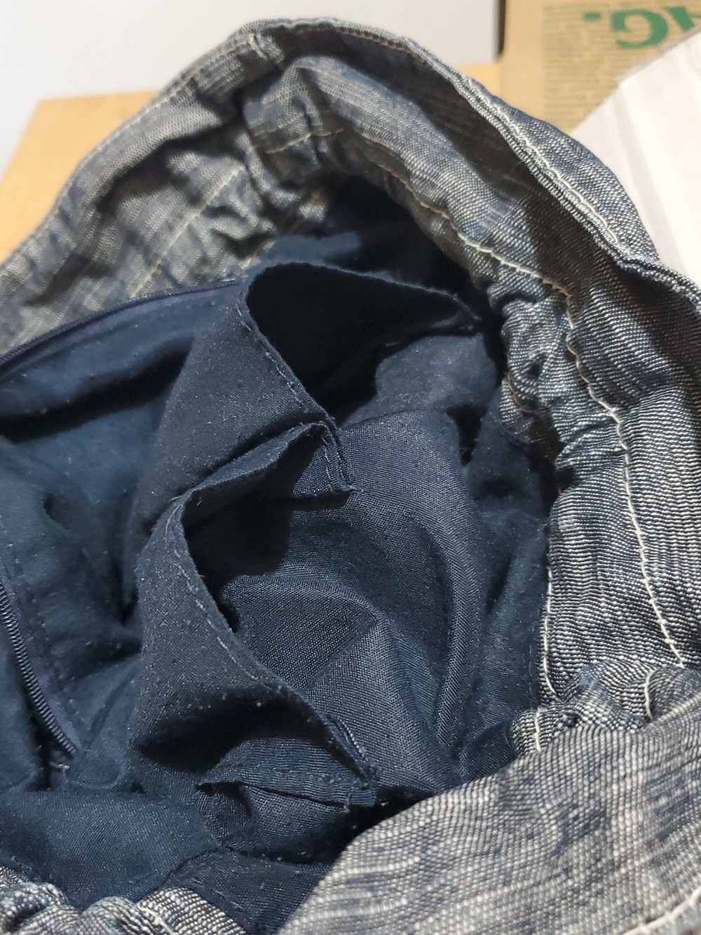 Denim-Look Drawstring Backpack with Cream Strap Details - Picture 12 of 12